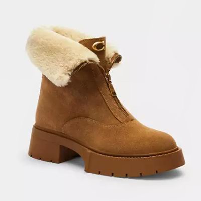 白菜价！Coach Outlet 男女时尚运动鞋、长短靴等2.6折起！入穆勒鞋、运动鞋！